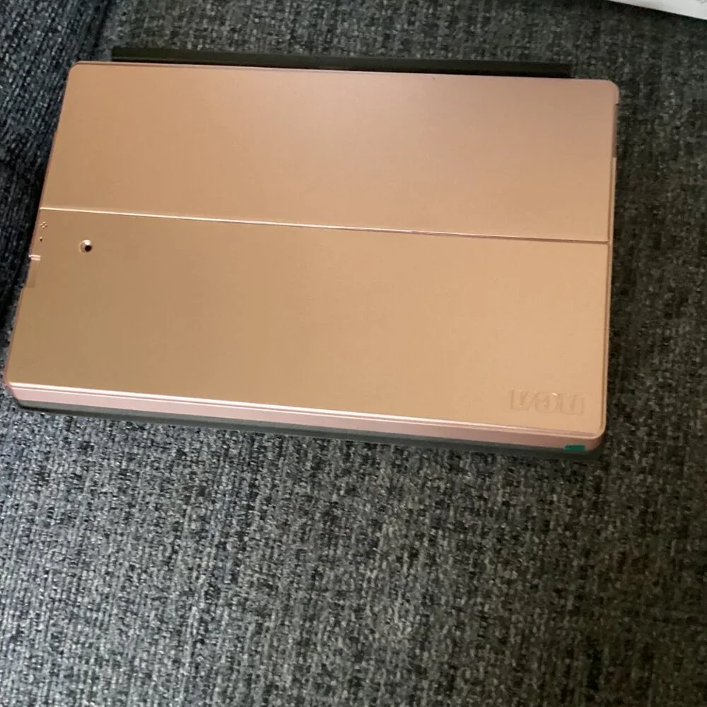 New RCA 2-in-1 Notebook/tablet w/keyboard & head phone